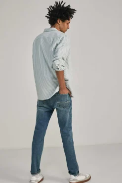 * Jeans Slim Lavado Medio Ensuciado Turquesa Hot
