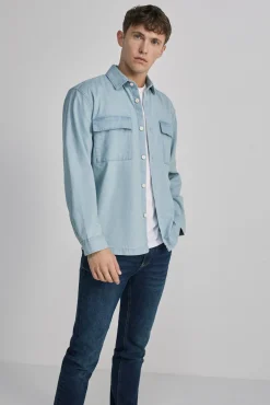 * Jeans Slim Lavado Oscuro Ensuciado Turquesa